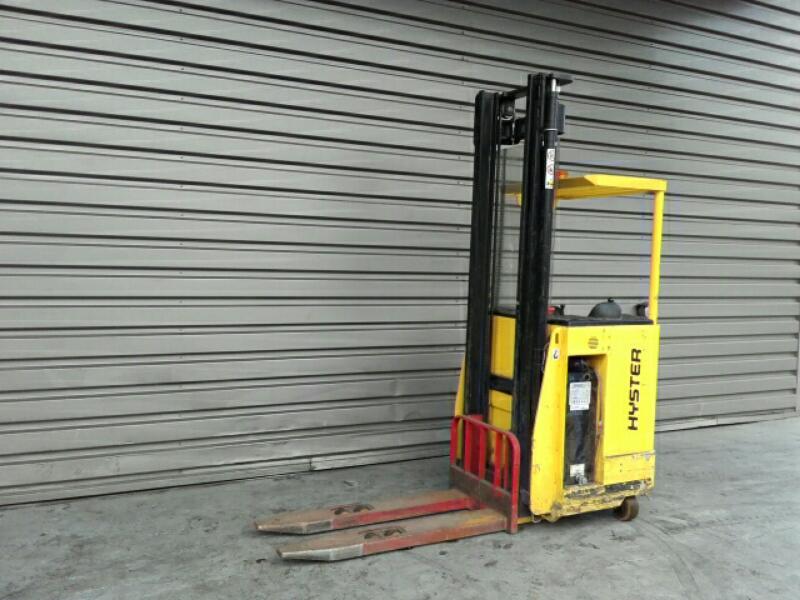Pallet stacker with rider seated secondhand on sale at ...