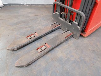 Sit-on pallet stacker with rider seated Fenwick L12